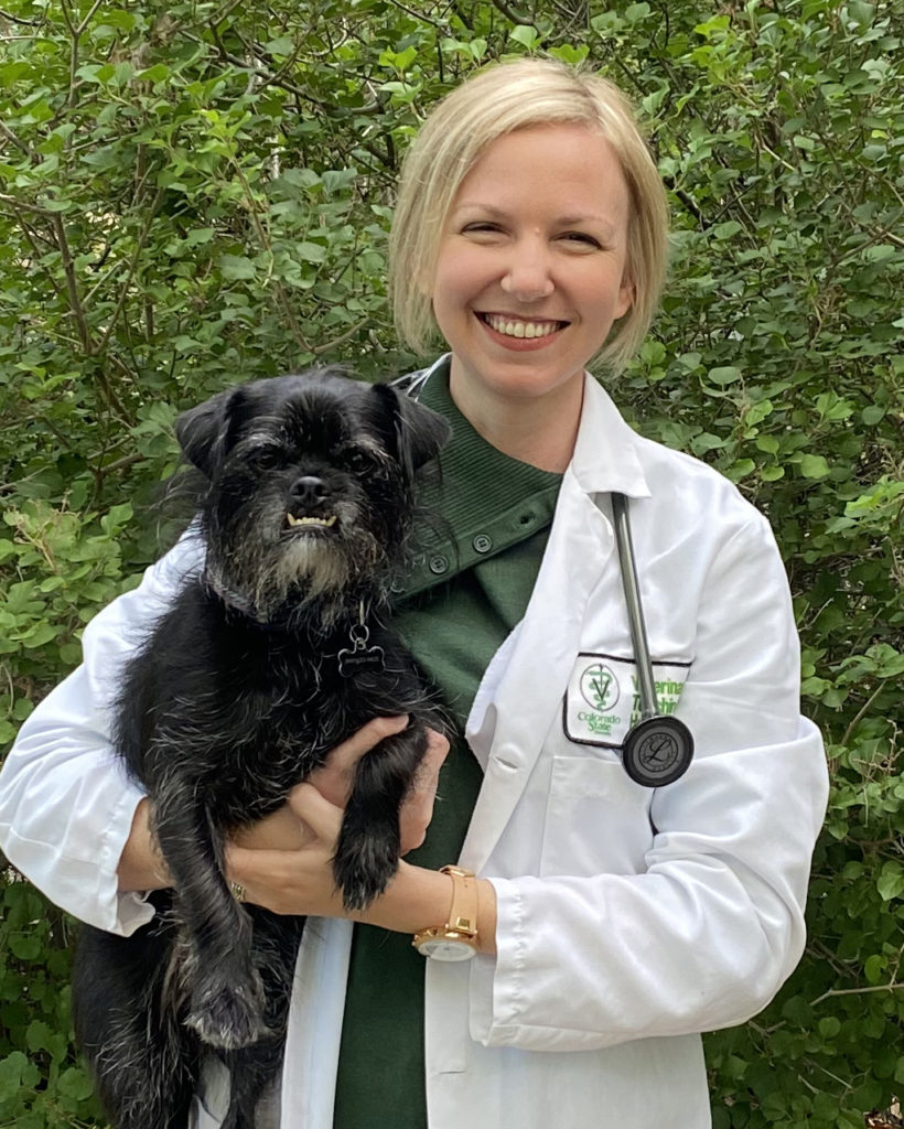 Dr. Ashley Parker with black dog