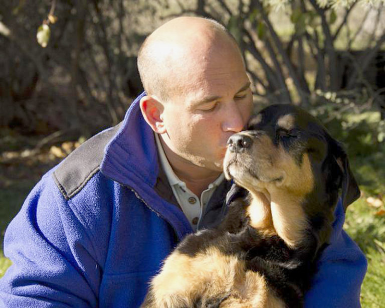The Lucy Suites are named for a special Rottweiler named Lucy. Pictured here with her owner and lead donor, Jeffrey Neu.